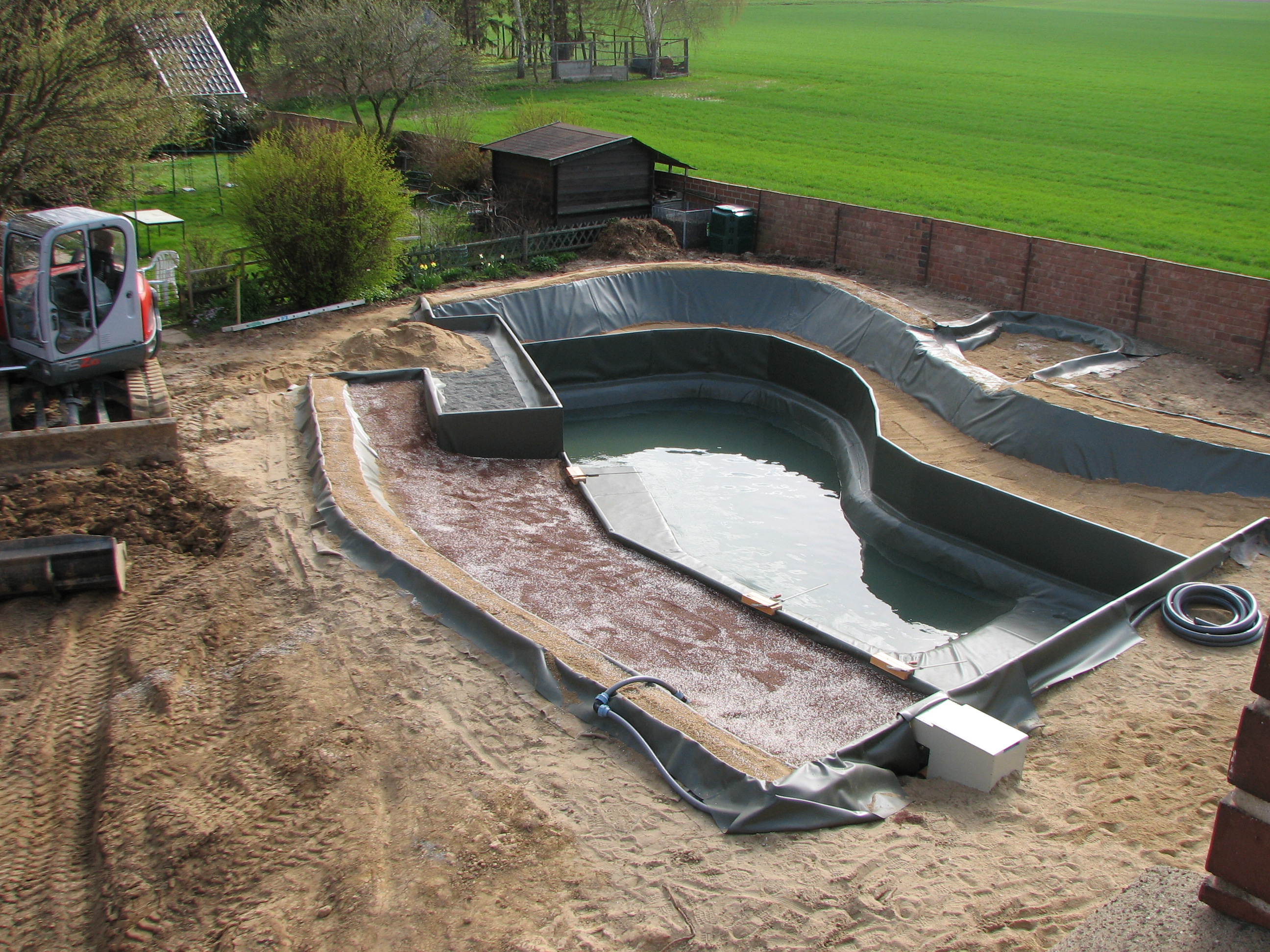 Fotos der Arbeiten am Schwimmteich der Familie Schweda in Hoheneggelsen